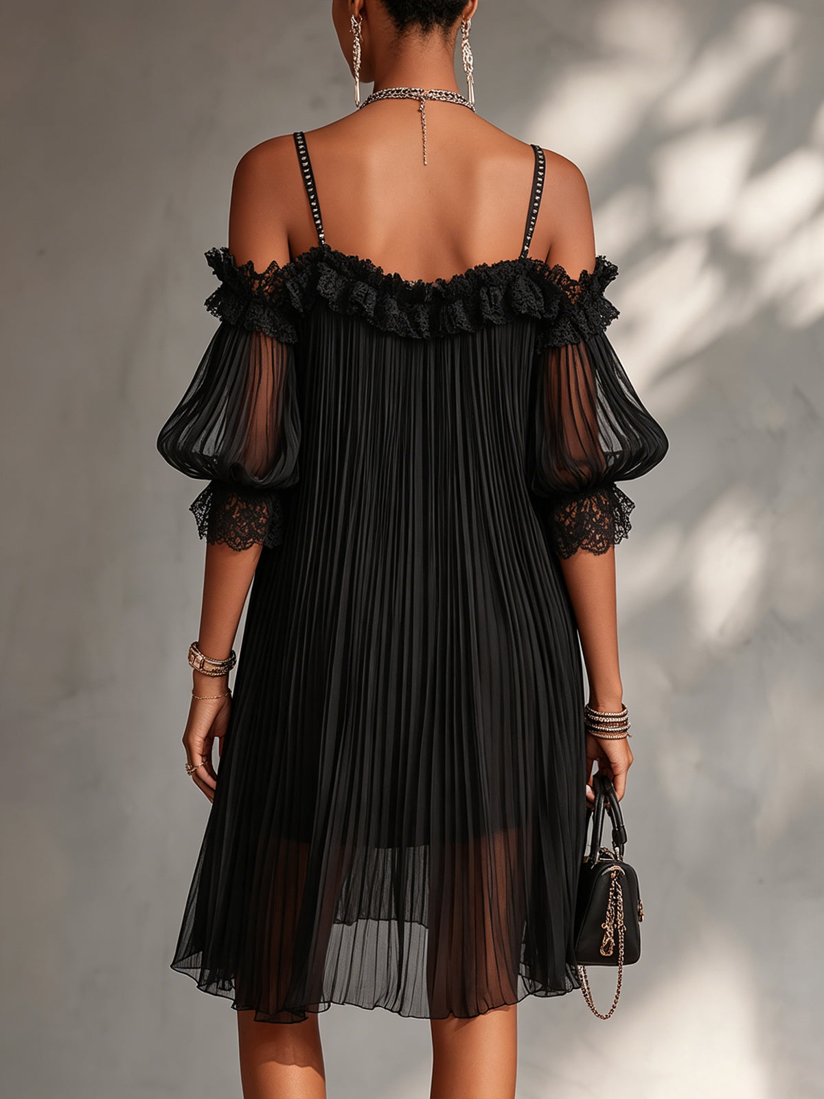 Vittoria | Black mini dress in muslin with off-shoulder design and lace edges