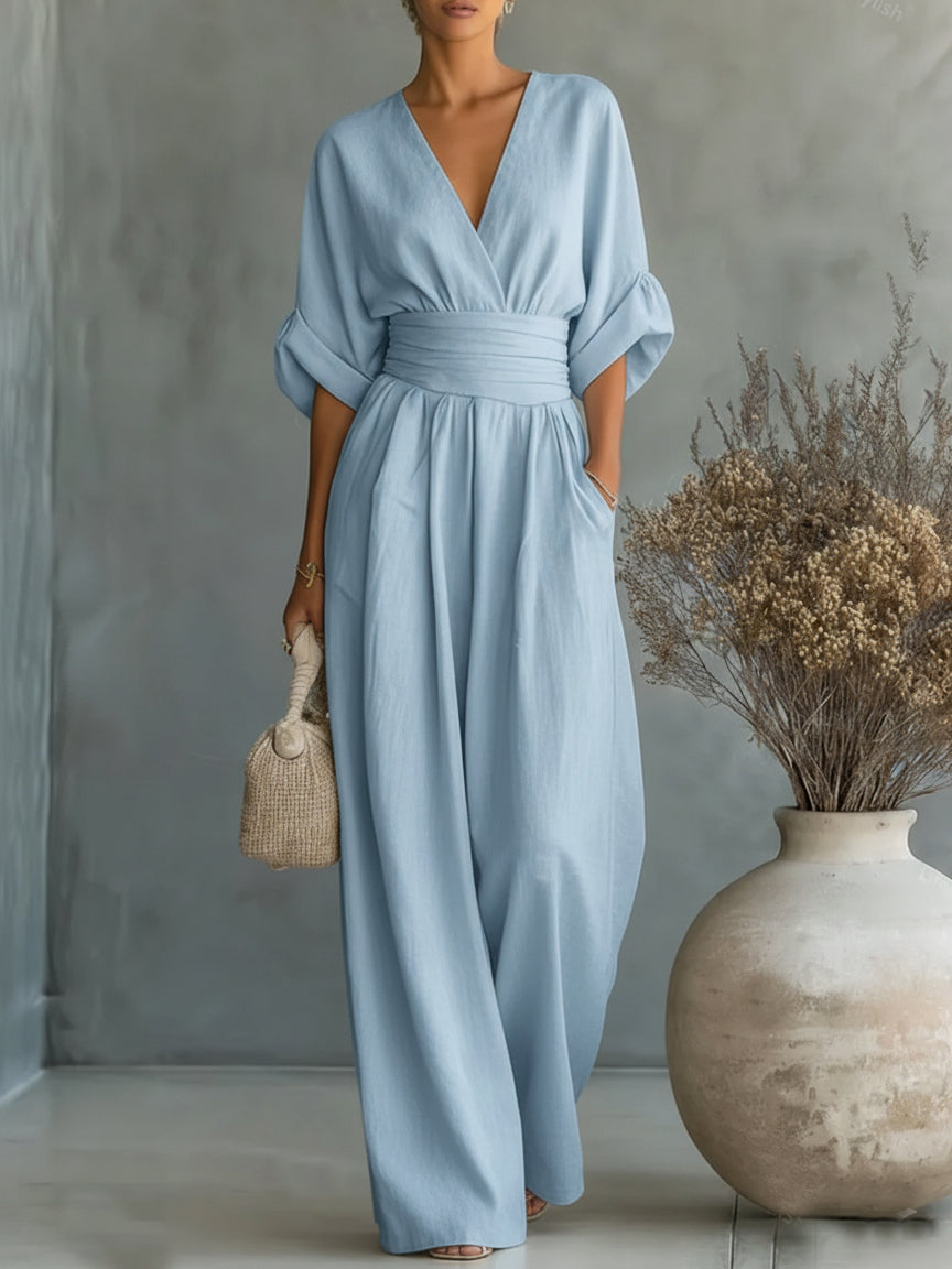 Elegant jumpsuit with V-neck, high waist, and wide leg
