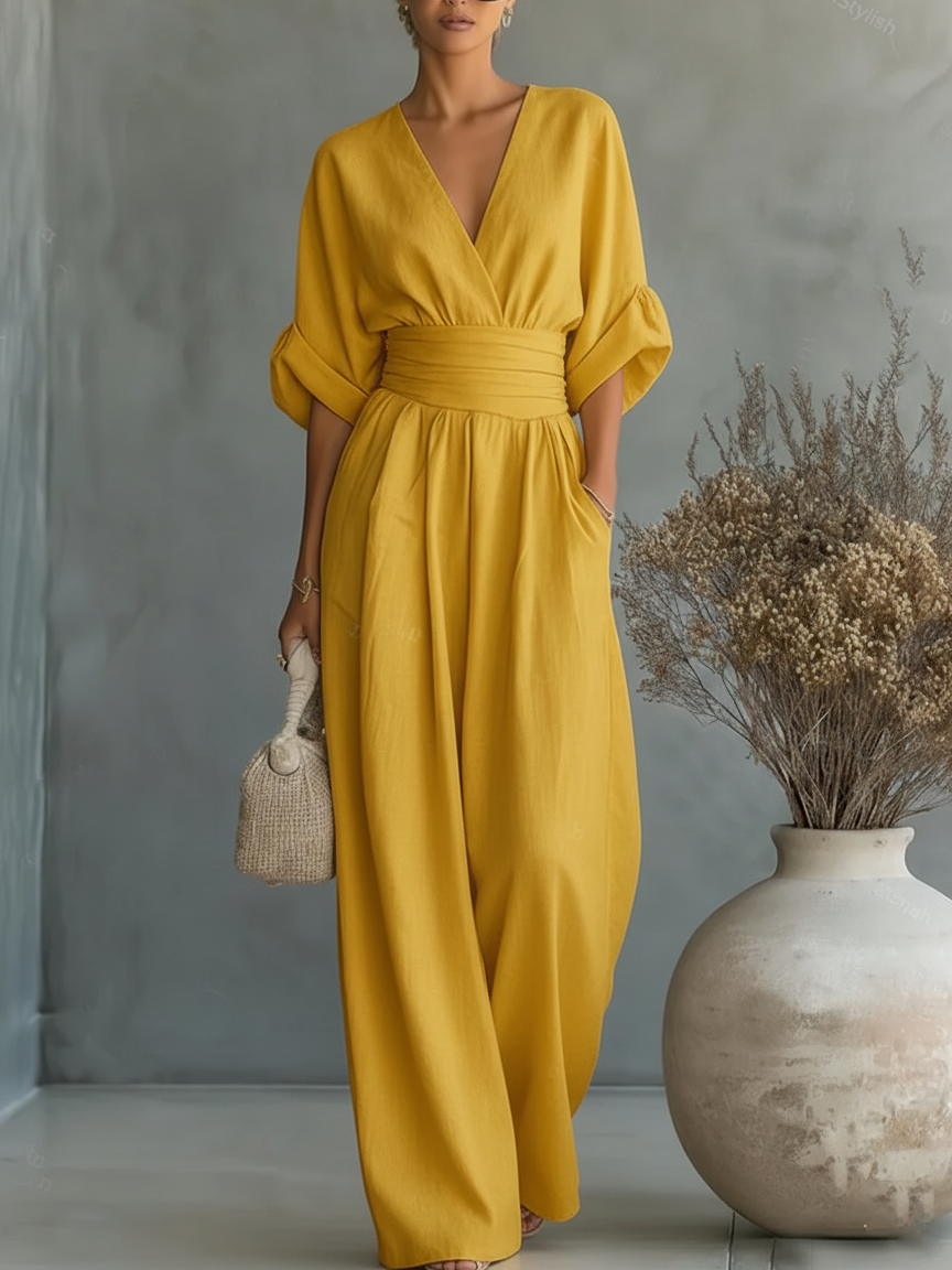 Elegant jumpsuit with V-neck, high waist, and wide leg