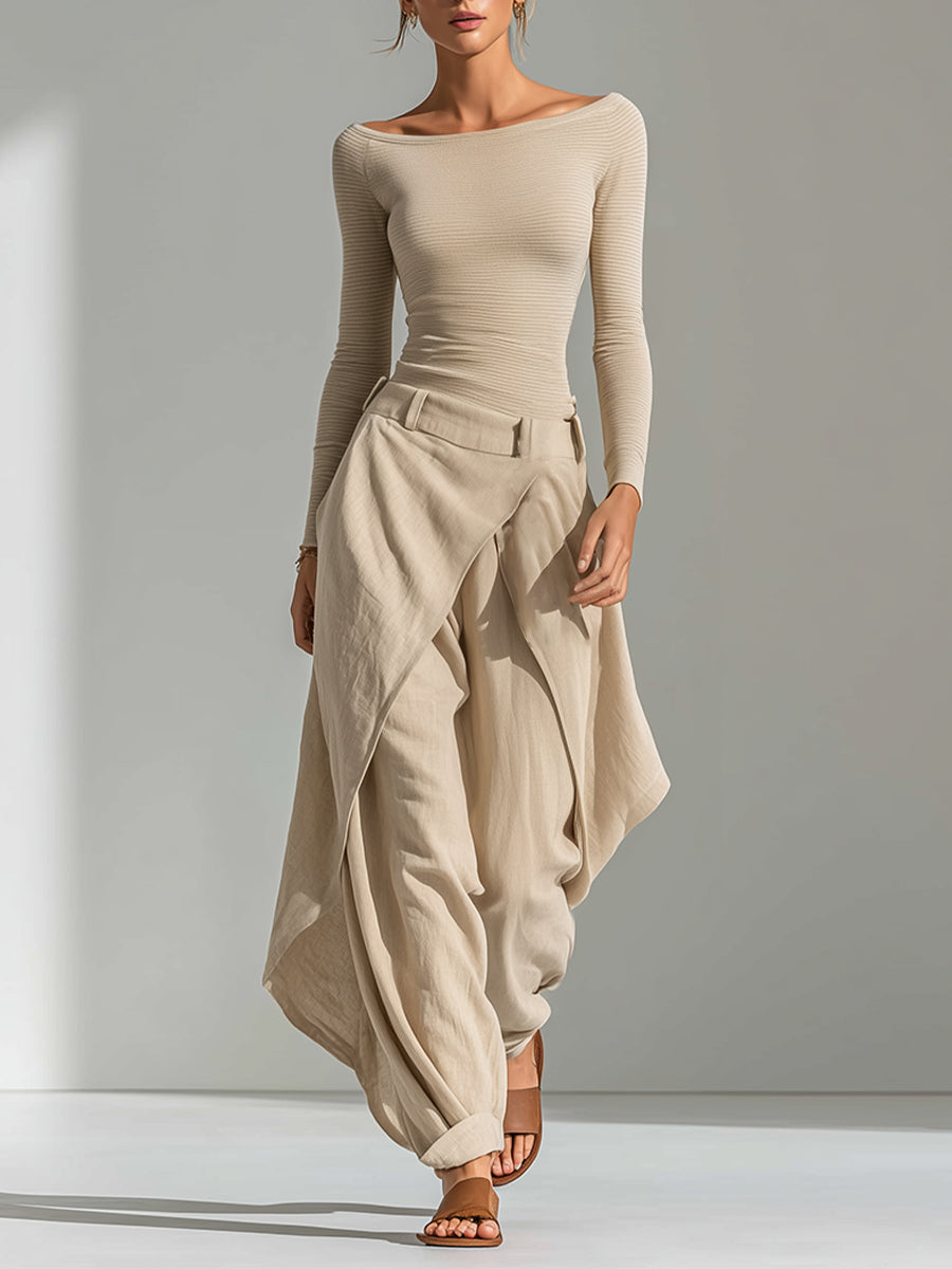 Top beige with boat neckline and wide-leg overlay pants.