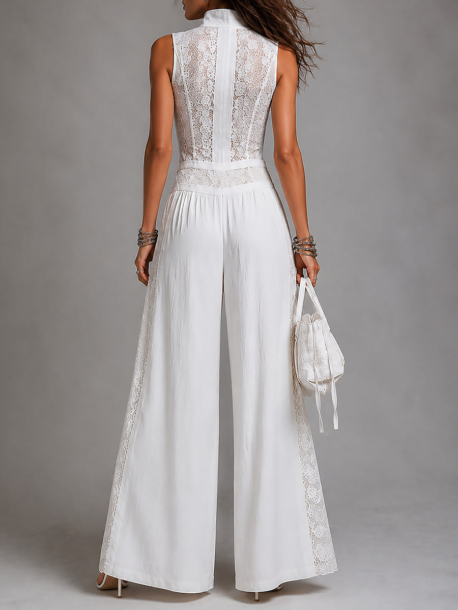 Vintage jumpsuit with high collar and wide leg with lace panels