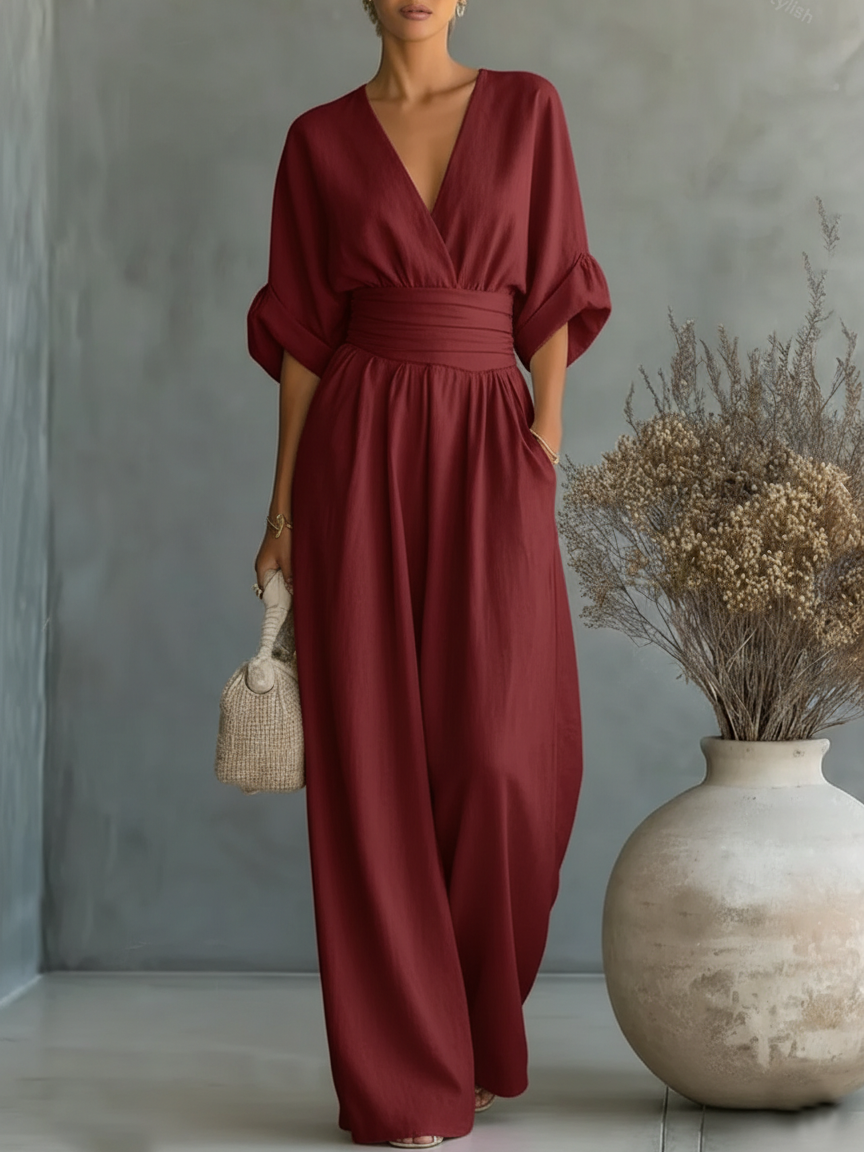 Elegant jumpsuit with V-neck, high waist, and wide leg