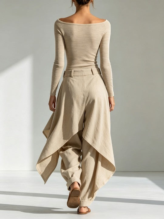 Top beige with boat neckline and wide-leg overlay pants.