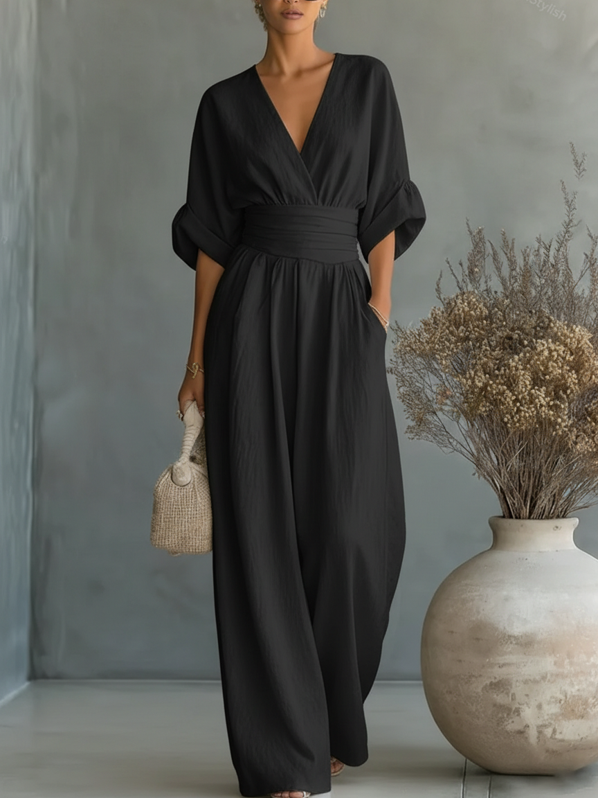 Elegant jumpsuit with V-neck, high waist, and wide leg